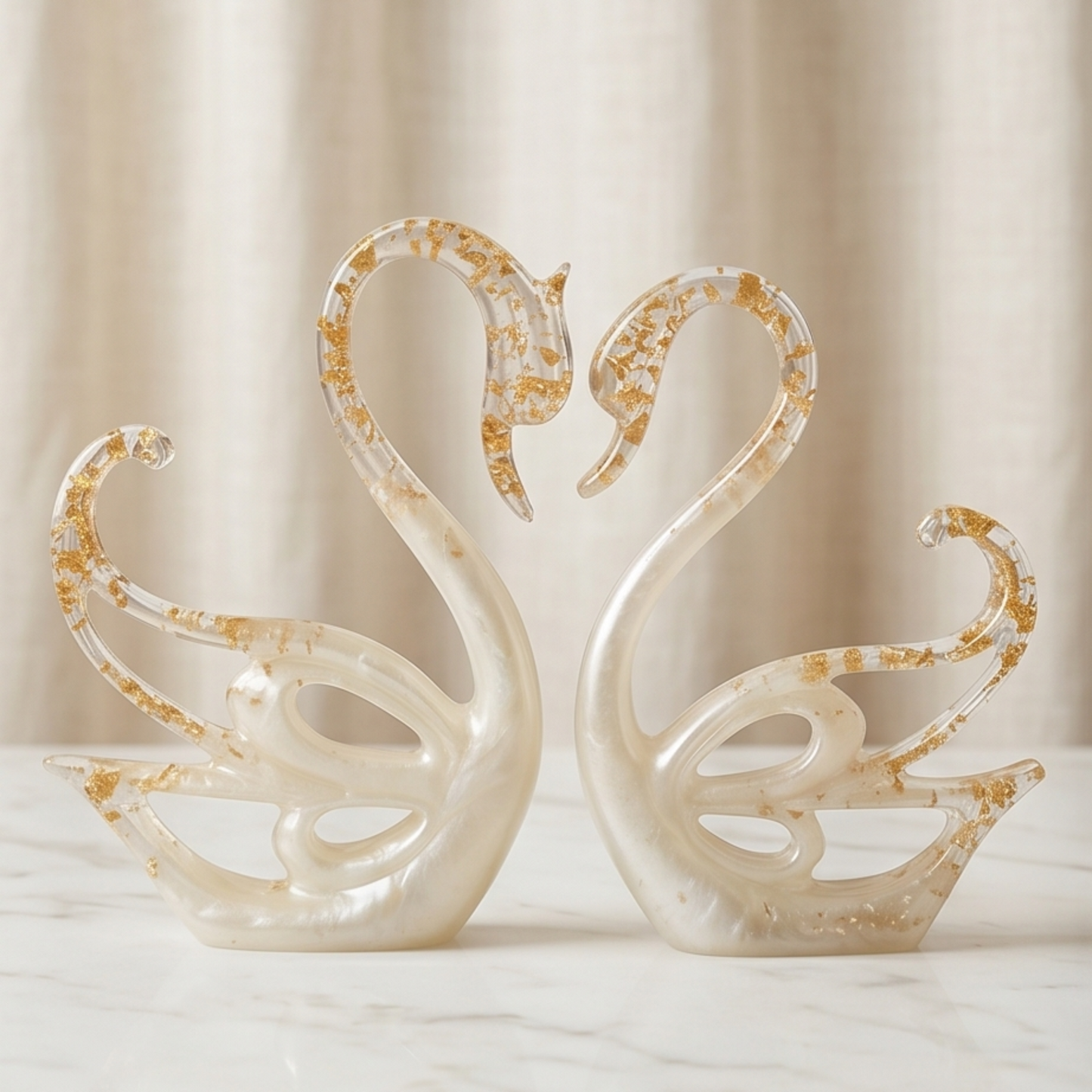 White and gold Swan couple